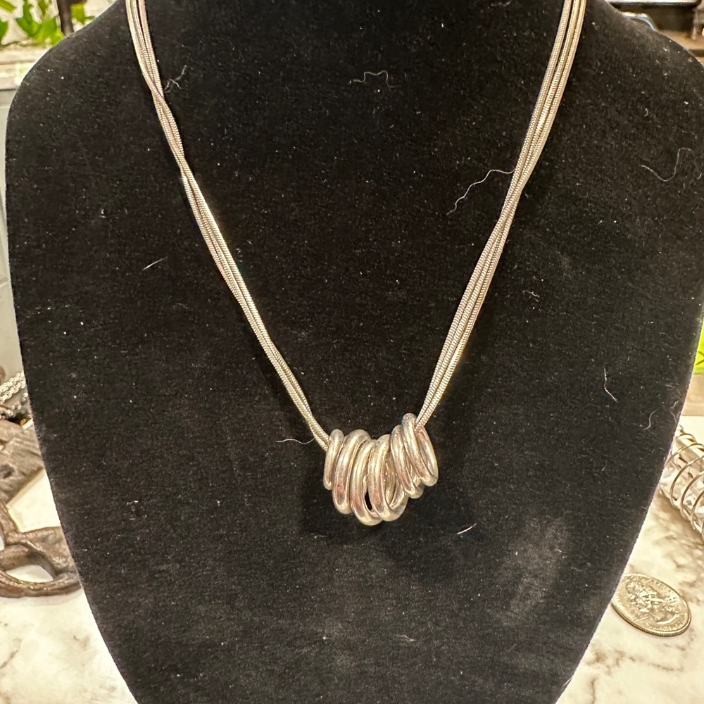 Elegant Lia Sophia Silver hoops Necklace